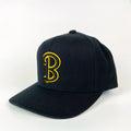 Beachwood "B" Snapback in Black with Black and Yellow embroidery.